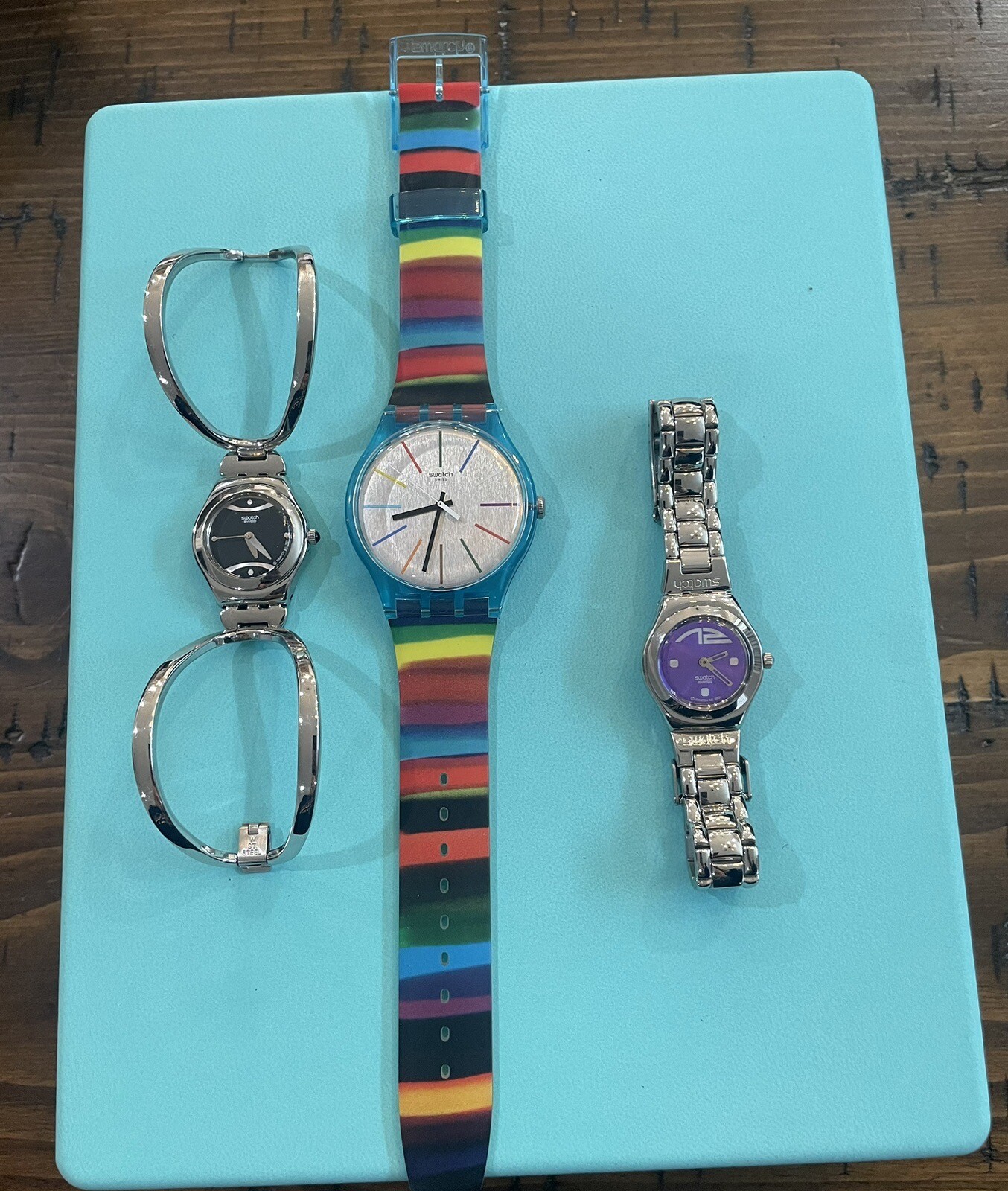 swatch watches lot of 3 all three need batteries, not perfect but