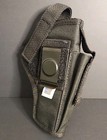 Black nylon IWB holster with textured grip, metal clip, and two front pockets, USA made.