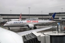 PHOTO  BOEING 787-9 DREAMLINER N26952 OF UNITED AT CHARLES KINGSFORD SMITH AIRPO