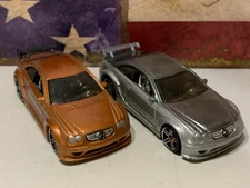 HOT WHEELS MERCEDES AMG CLK DTM X2. 2008 COPPER & 2006 SILVER