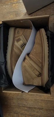 This is a pair of UGG Kids Neumel Snapback boots in chestnut suede Size 11