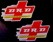 2- Dr. D Dubach Racing Development Stickers. Size3x 2. Glossyfinish. Self A 2- Dr. D Dubach Racing Development Stickers. Size3x 2. Glossyfinish. Self A