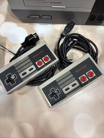 Nintendo NES Console 2 OEM Controllers With Super Mario Bros. And Duck Hunt