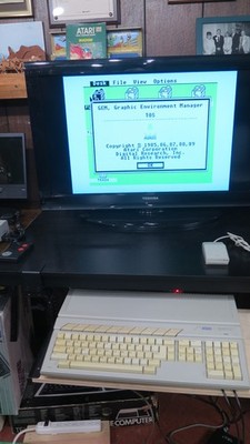 Atari 1040STE COMPUTER WITH DIGITAL HARD DRIVE COMPONENTS AND TV CONVERTER