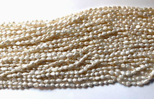 VINTAGE NATURAL WHITE FRESH WATER RICE PEARLS 16" 7X4 MM WHOLESALE