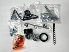 Erector Set Parts from 5550. Unopened bags of parts plus a set of wheels.
