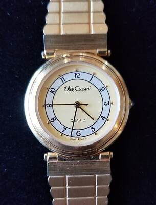 Oleg Cassini Gold Tone Watch Yellow Dial Adjustable Band 6''-7.5'' New Battery