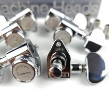 A set of 3R3L locking electric guitar tuners with locking tuning knobs.