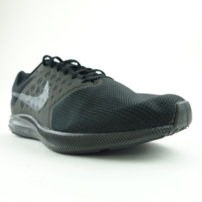 solid black nike tennis shoes
