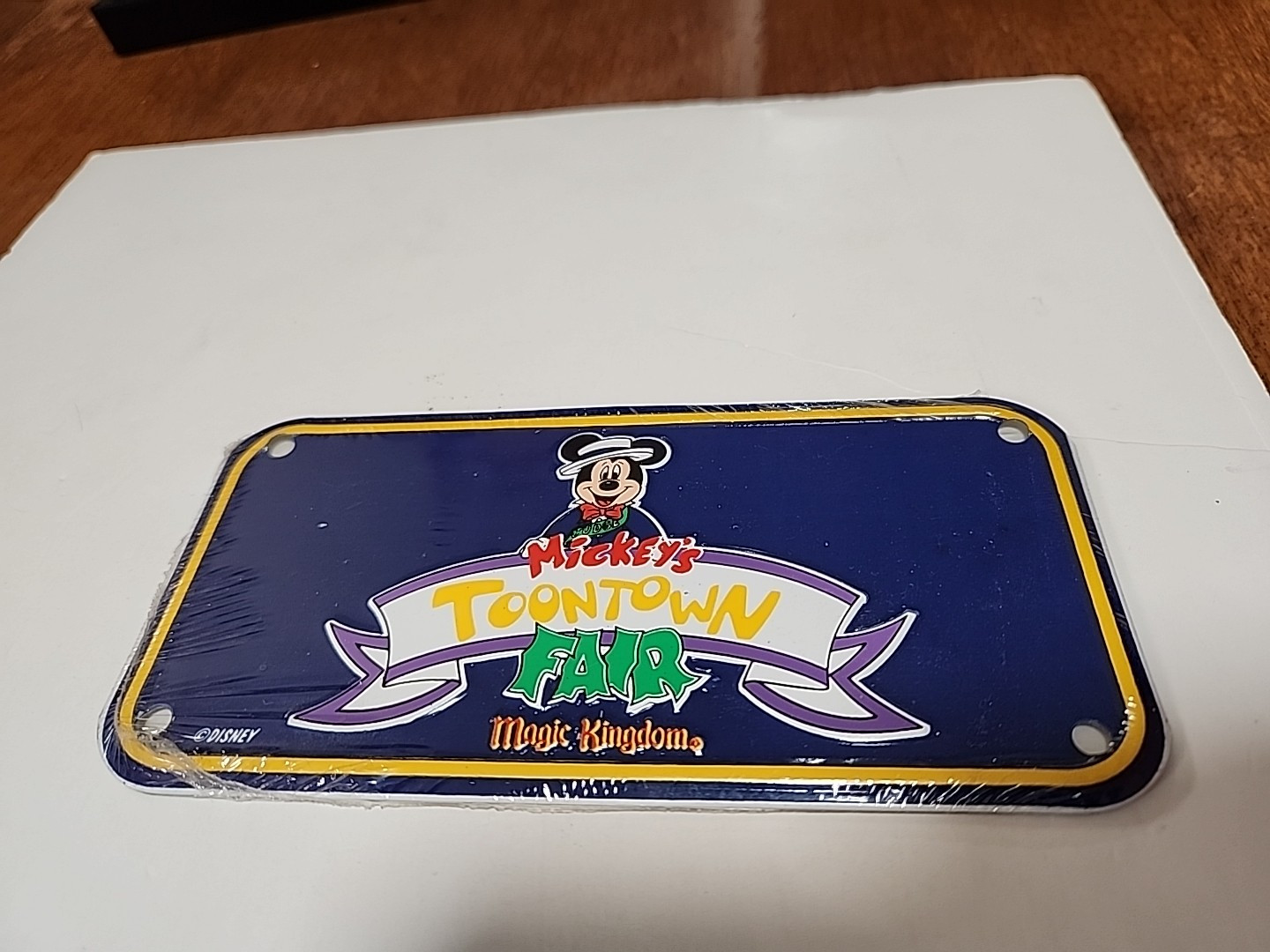 Disney MICKEY'S TOONTOWN FAIR  Magic Kingdom bicycle license plate Brand New