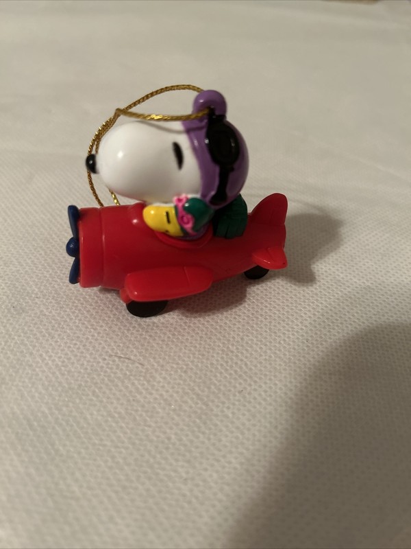 Vintage Peanuts Snoopy and Woodstock Christmas Plane Ornament USED