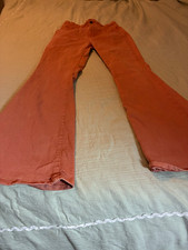 We The Free Women's orange Solid Flare Pants Flared Flat Front Button Regular