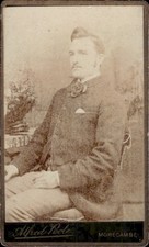 Man Sitting Table A.Poole Morecambe Studio CDV Card Photograph (CDV4-16)