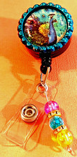 Bird Peacock 1 Id badge holder retractable alligator clip