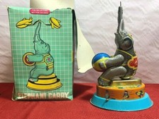 VINTAGE ELEPHANT CARRY PLANE TIN METAL TOY YT41