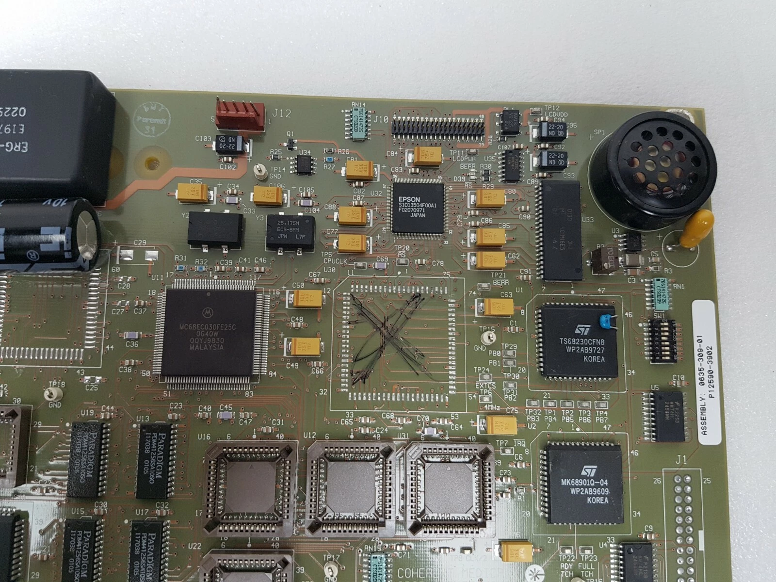Upper right: Epson display controller, ST TS68230 and MK68901 chips, speaker