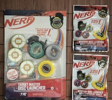 NERF Target Disc Launcher 3 Discs, Launcher,  3 Targets  2 Extra Packets