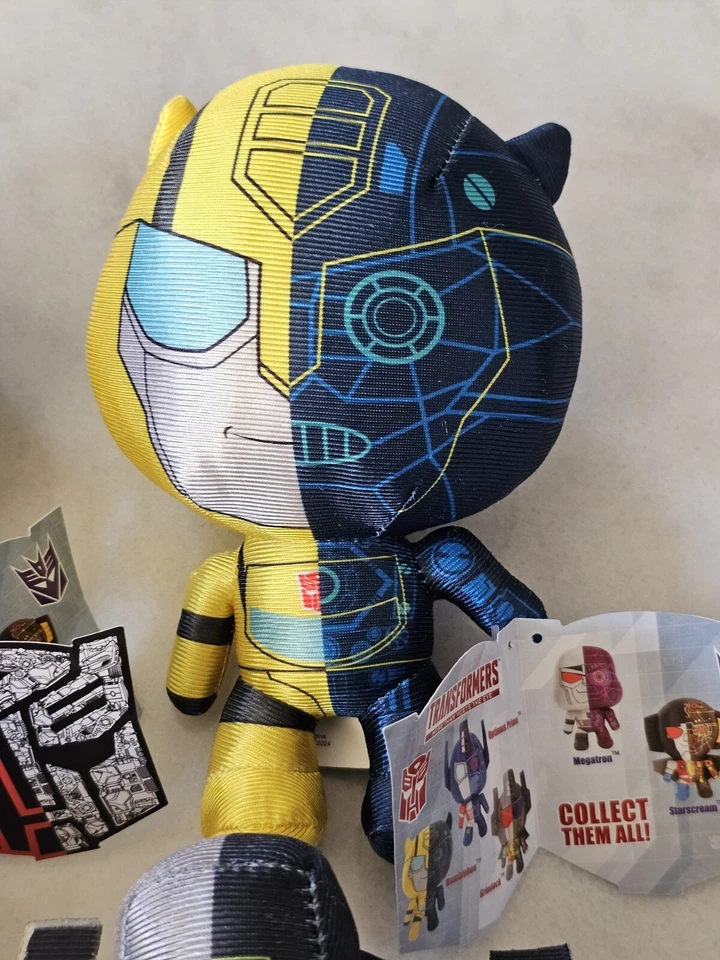 Transformers More Than Meets The Eye Juego de 4 Peluches Metálicos Edición Limitada NUEVO Foto 3 de 4
