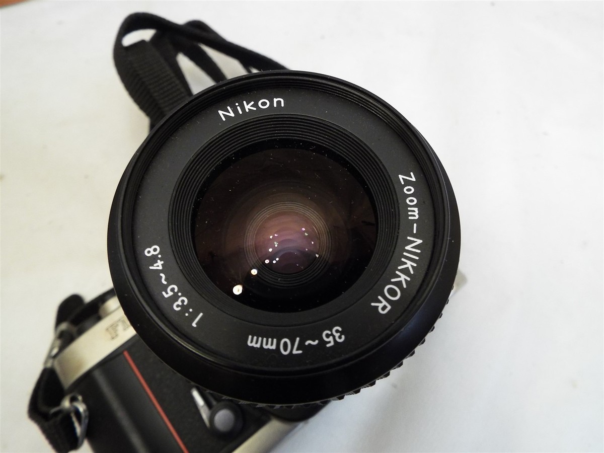 Vintage Nikon FM10 35mm SLR Film Camera w/Case 35-70mm Zoom Lens