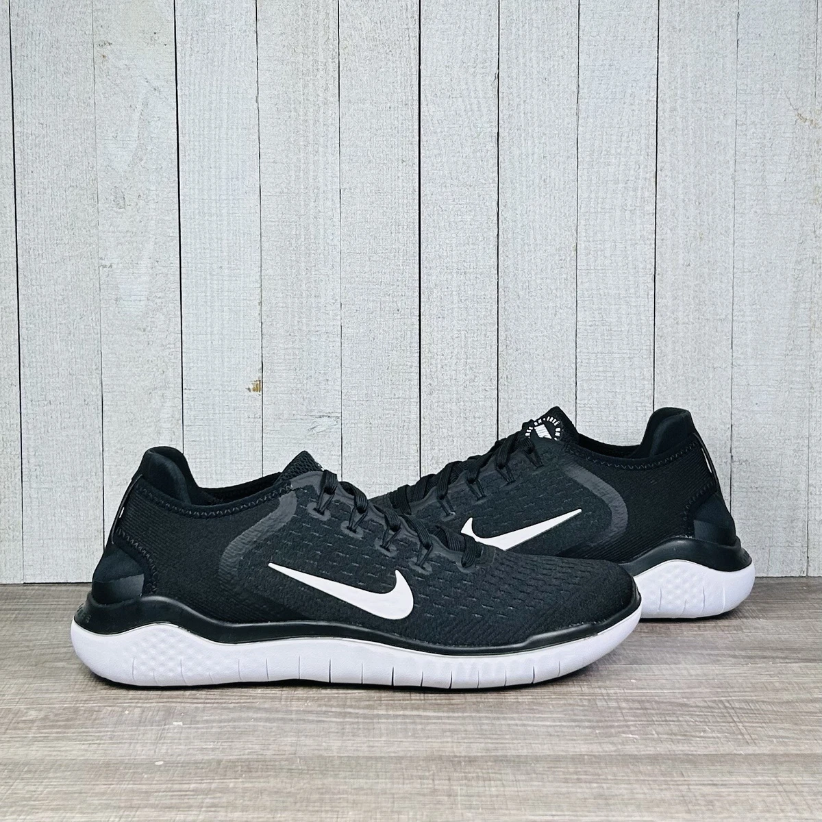 Womens nike free rn 218 black and white clearance
