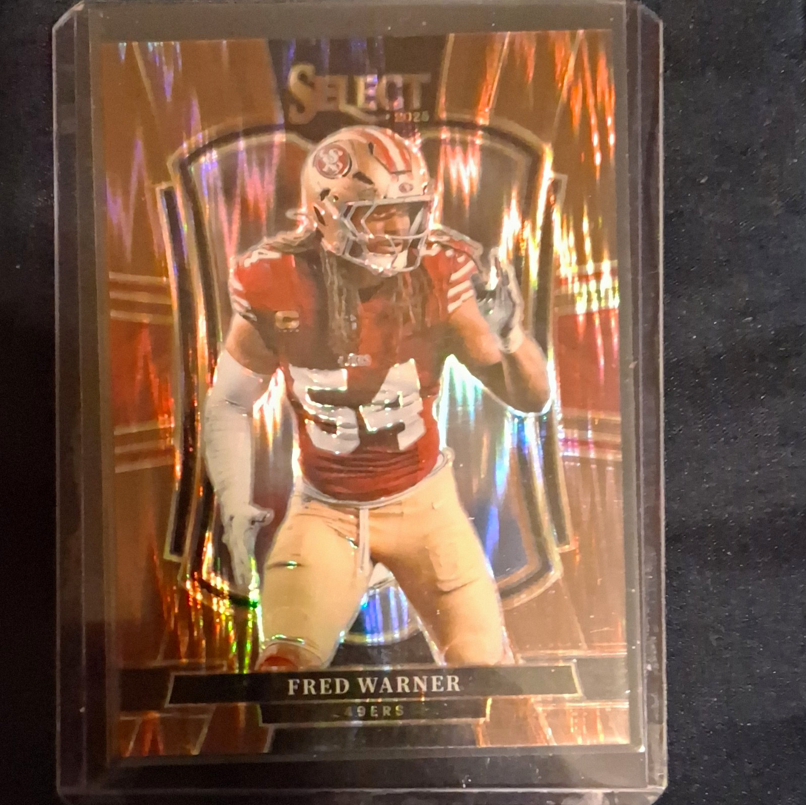 Panini Select 2025 Fred Warner Premier Level Copper Shock Prizm #118 /899