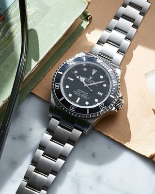 Rolex Sea-Dweller 16600 Stahl 40mm Schwarz 2002 Box Papiere Gut