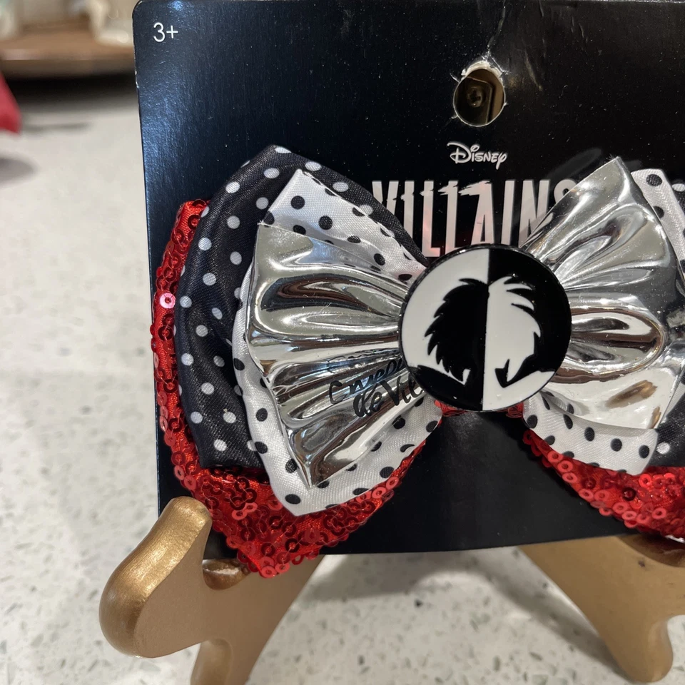 Disney Villanos Cruella De Vil 101 Dalmations Pelo Moño Disfraz Juegos con disfraces Nuevo Diablo Foto 2 de 4