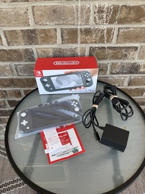 Nintendo Switch Lite Gray Console, Charger, HDMI Cable & 64GB Micro SD