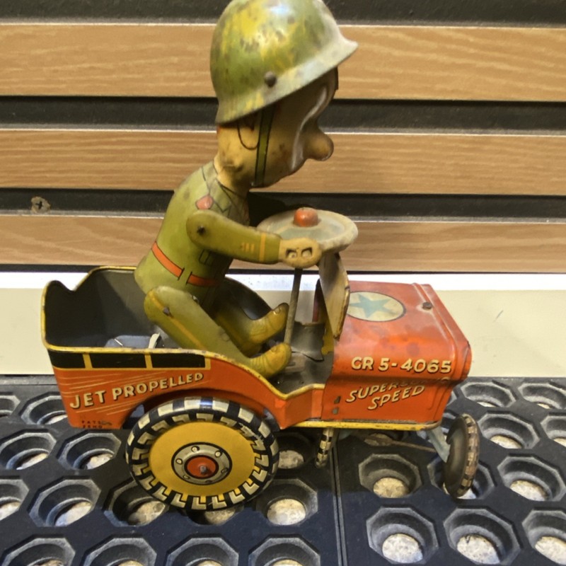 Unique Art Mfg. Co. G.I. Joe Jouncing Jeep Tin Wind-Up Toy 1944 Vintage