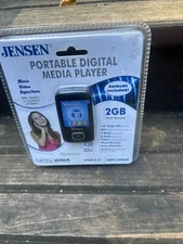 BRAND NEW Sealed Jensen SMPV-2GBUB (2 GB) Digital Media Player (p). NIP
