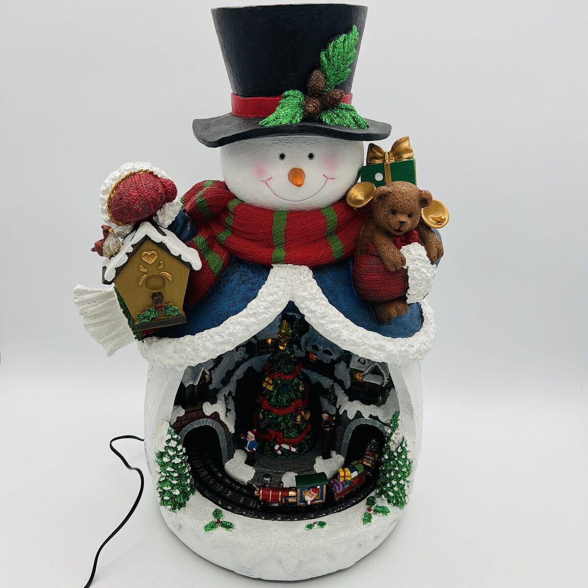 Lighted Snowman With Rotating Train 8 Classic Holiday Songs Lighted Snowman With Rotating Train 8 Classic Holiday Songs