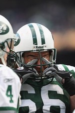 Guard Alan Faneca New York Jets rubs his eyes in the huddle durin- 2008 Photo 2