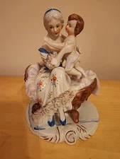 German Victorian Style Woman And Child In Chair