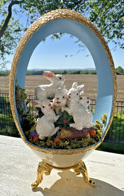 Easter Egg Diorama on a Gold Pedestal with a Blue Egg and Bunnies Inside