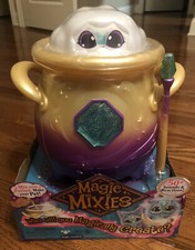 Magic Mixies Magical Misting Cauldron with Interactive 8 inch Blue Plush Toy