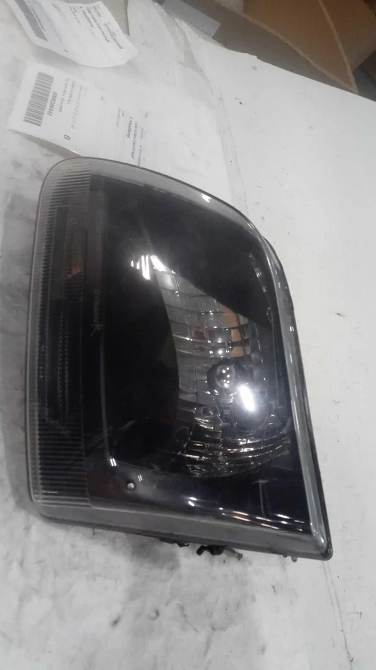 Conjunto de faros izquierdos usados se adapta a: camioneta Ford F250 1998 grado B izquierda Foto 2 de 4