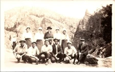 RPPC Group Valley Men Crouching Women Standing Rock c1910s photo postcard FQ4