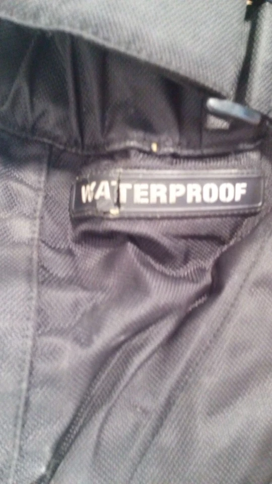 Pantalones impermeables Icon Patrol para motocicletas grandes negros equipo para mal tiempo Foto 2 de 4