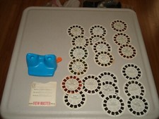Vintage 1980s View-Master with 20 Reels Peanuts Smurf Rudolph Bambi Sesame St