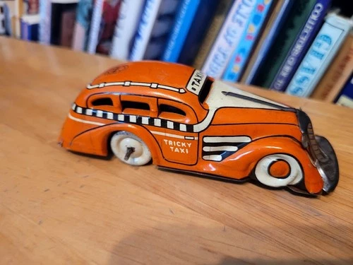 VERY NICE VINTAGE 1930'S MARX TIN LITHO ORANGE WIND UP TRICKY TAXI #2