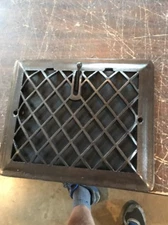 P 13 antique cleaned and lacquered crosshatch heating grate wall mount