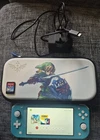 Nitendo Switch Lite Console and Case with Games Bundle Excellent Condition Blue