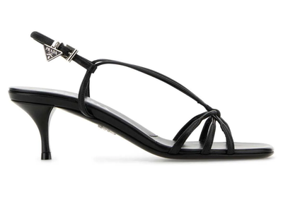 prada tobacco capretto sandals These are shoes I have been looking for 23 years!!! I know they are and I finally found a picture of what they where called which is Prada covered heel Prada Capretto Strappy 55mm Black