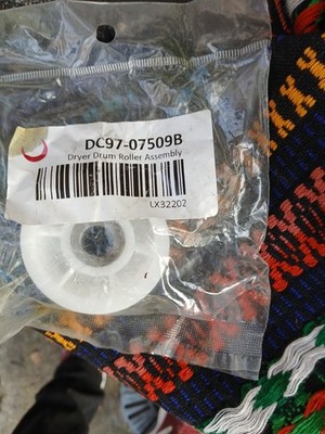 The item shown is a dryer part, specifically labeled as a Dryer Drum Roller Asse