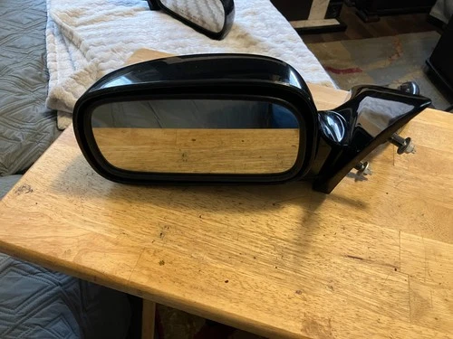 Drivers side mirror for a 2006- 2011 Cadillac dts