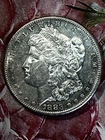 1883 S Morgan Dollar Gem Au. $600 Coin