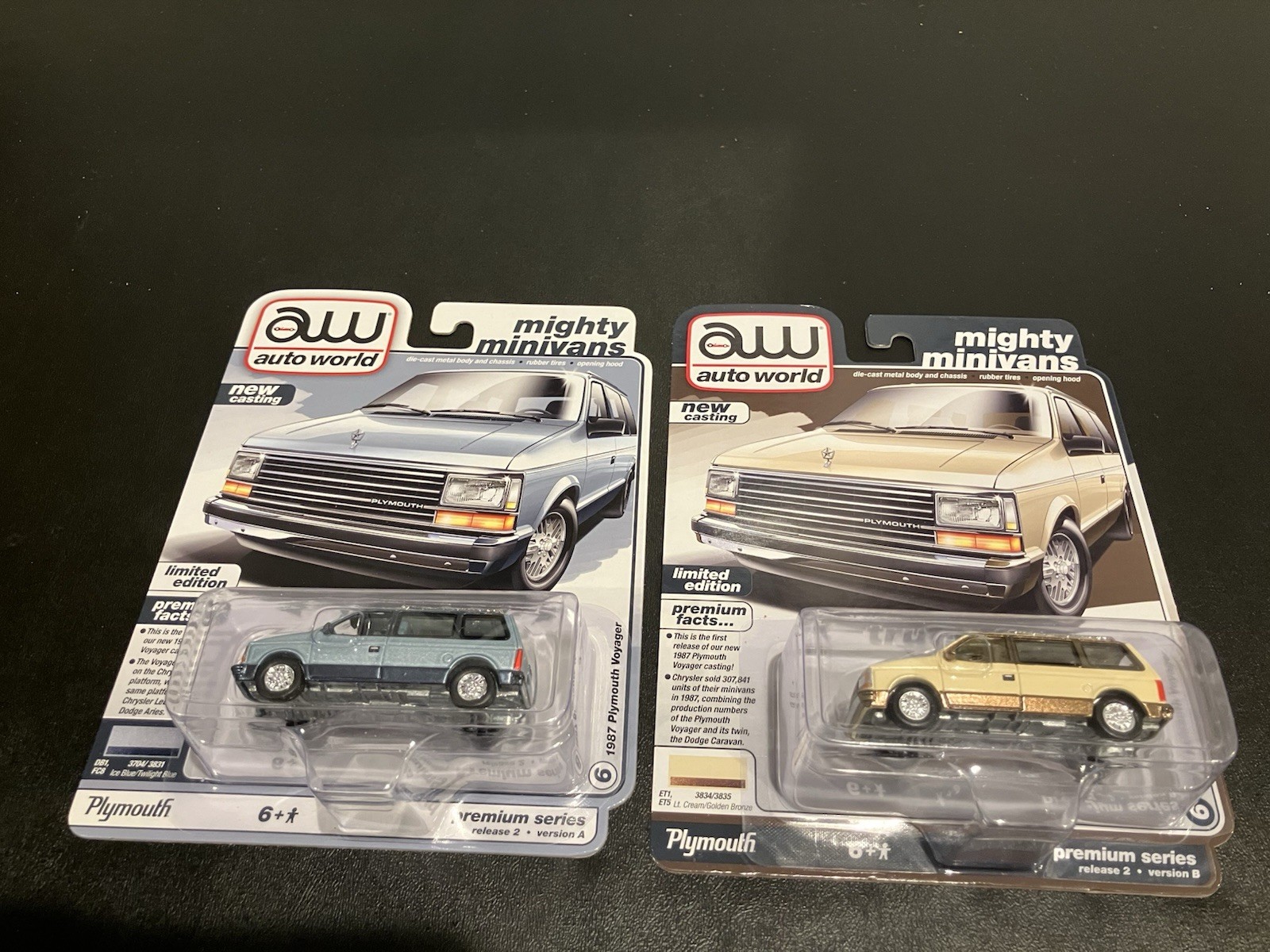 (2) Auto World 1987 Plymouth Voyager MiniVan Ice Blue / Lt Cream RARE