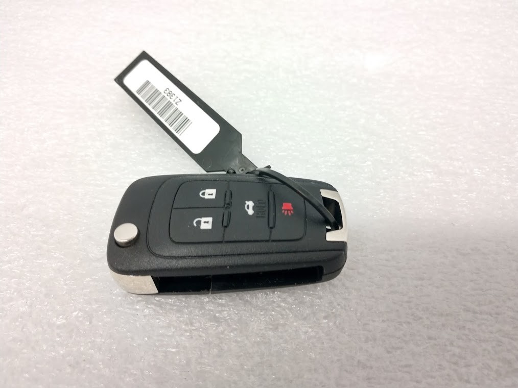 Impala 201417 OEM keyless entry flip key fob. Door lock, unlock hatch