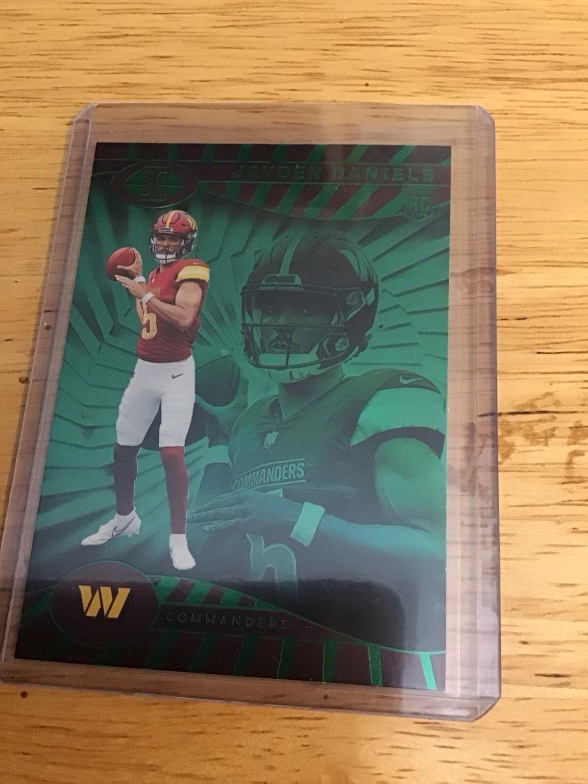 2024 Panini Illusions - Jayden Daniels #93 Trophy Collection Emerald (RC)