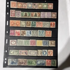 Small lot of stamps from around the world,mostly all used and have been hinged.